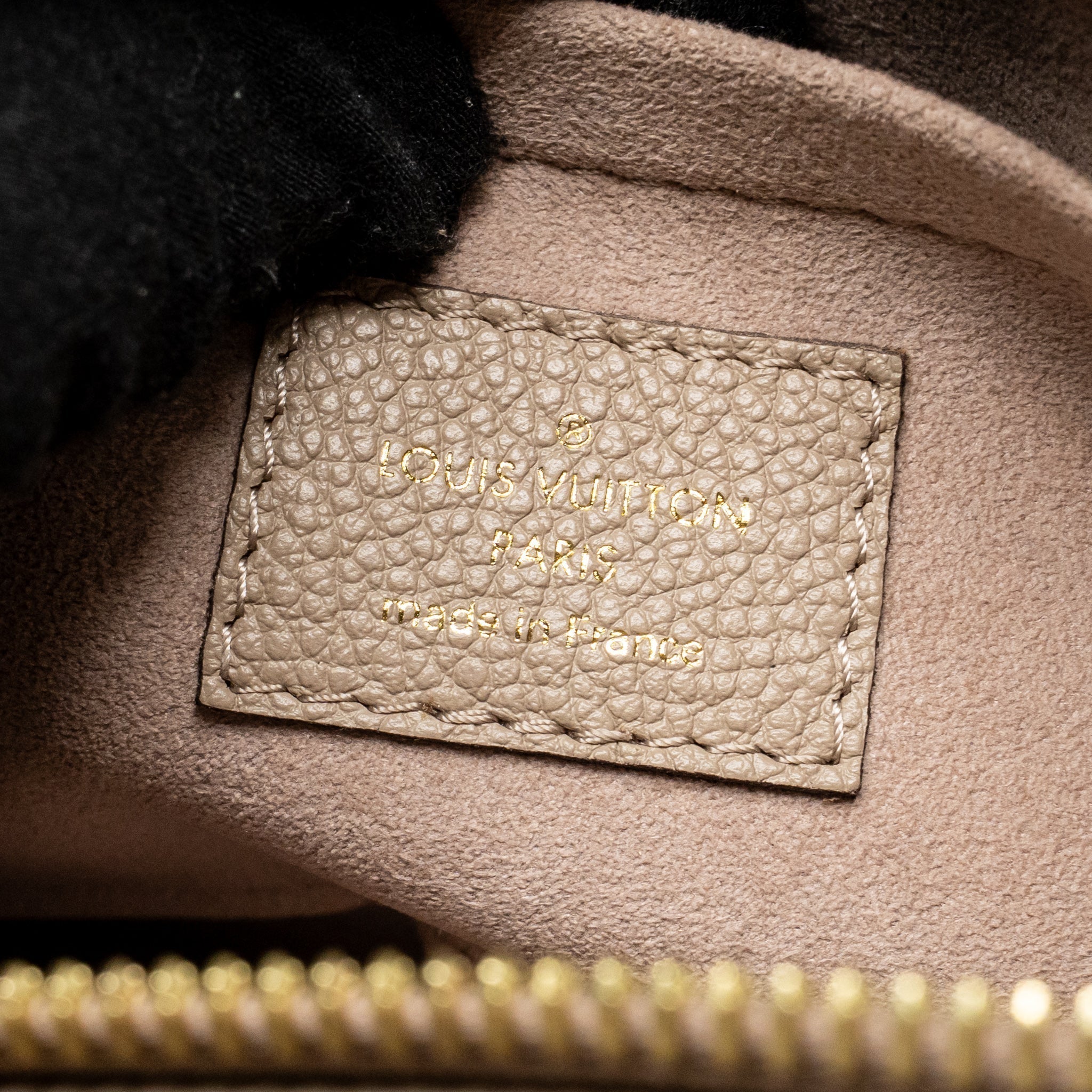 louis-vuitton-onthego-east-west-monogram-empreinte-leather-dove-cream-ghw-copy
