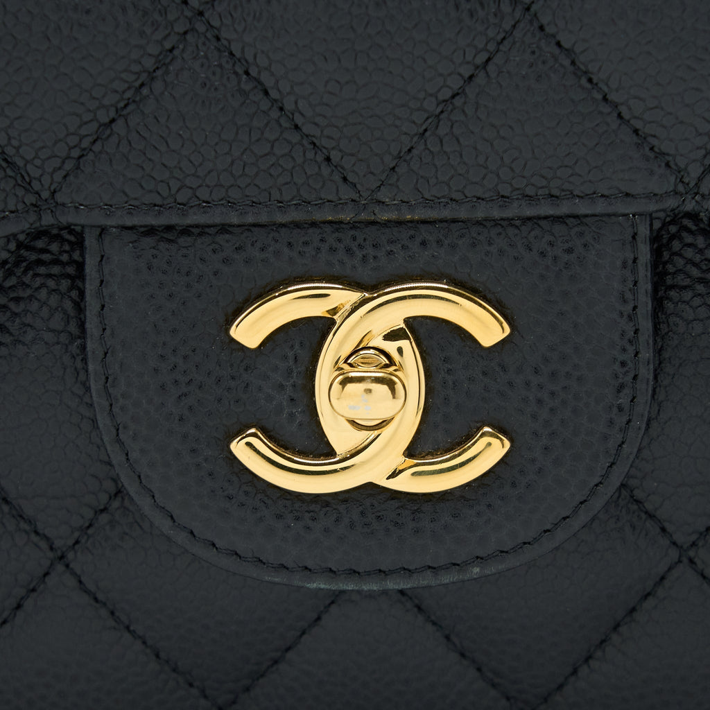 chanel-classic-jumbo-double-flap-bag-caviar-black-ghw-1