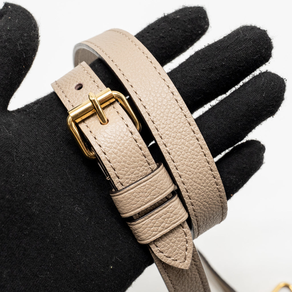 louis-vuitton-onthego-east-west-monogram-empreinte-leather-dove-cream-ghw-copy