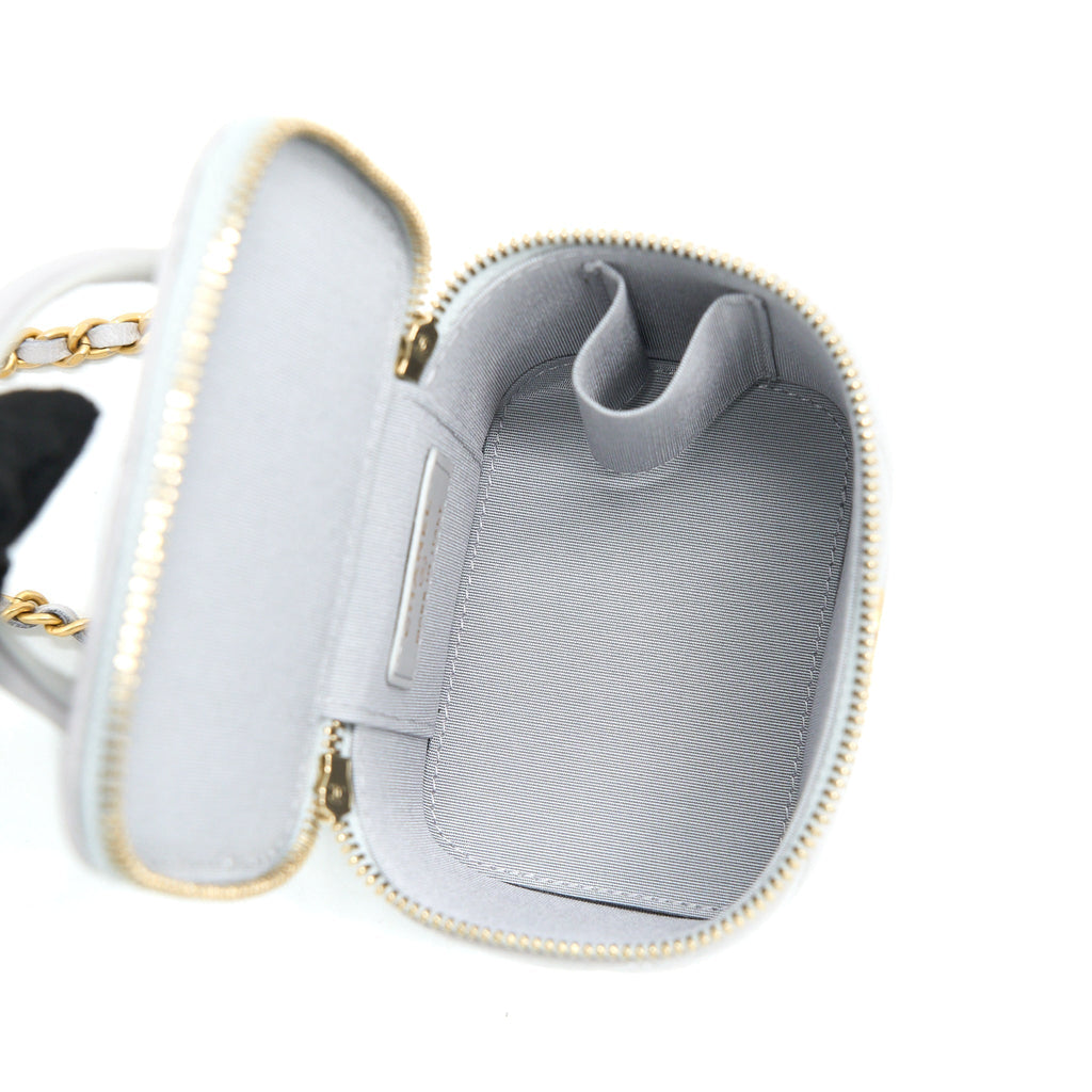 chanel-21a-top-handle-mini-vanity-with-chain-lambskin-light-grey-ghw