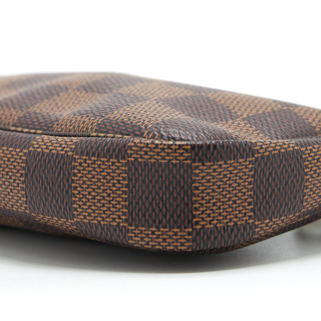 louis-vuitton-mini-pochette-accessories-damier-ebene-canvas-ghw-1