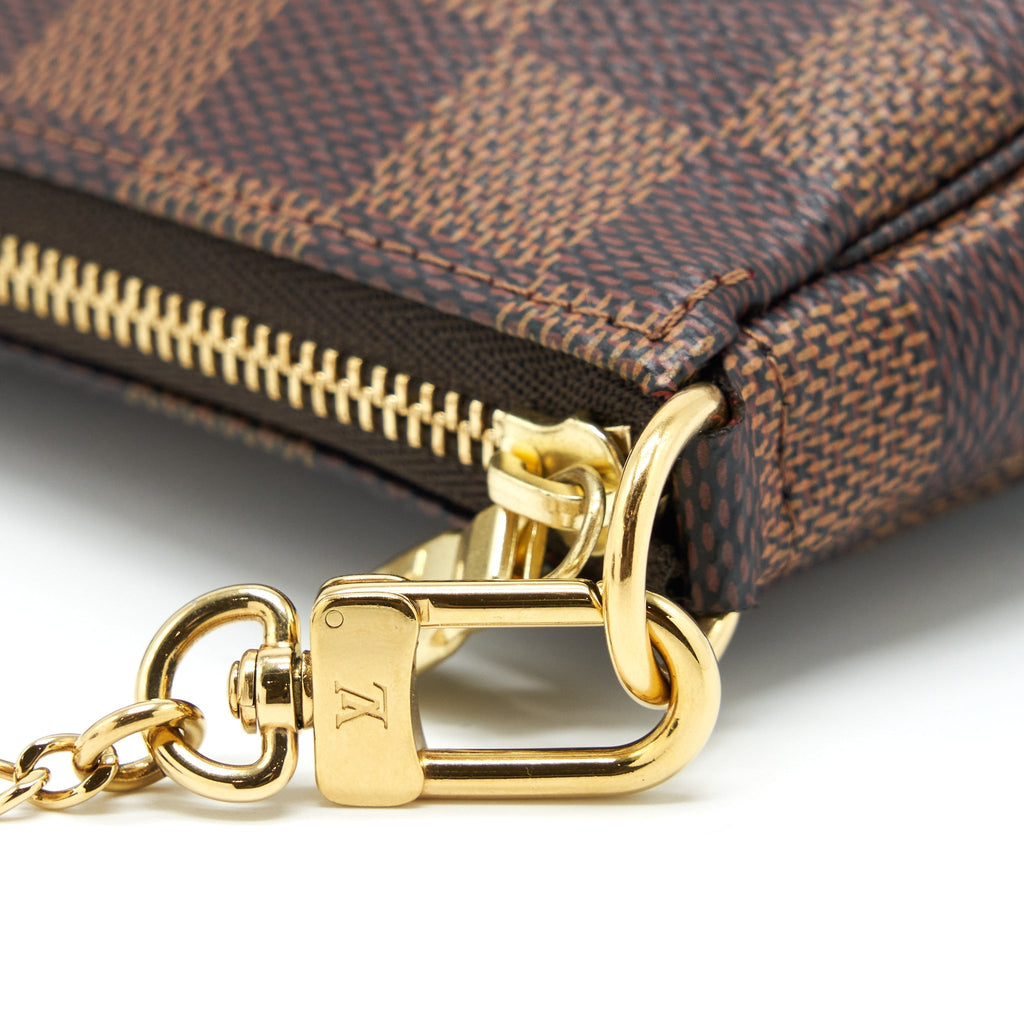 louis-vuitton-mini-pochette-accessories-damier-ebene-canvas-ghw-1