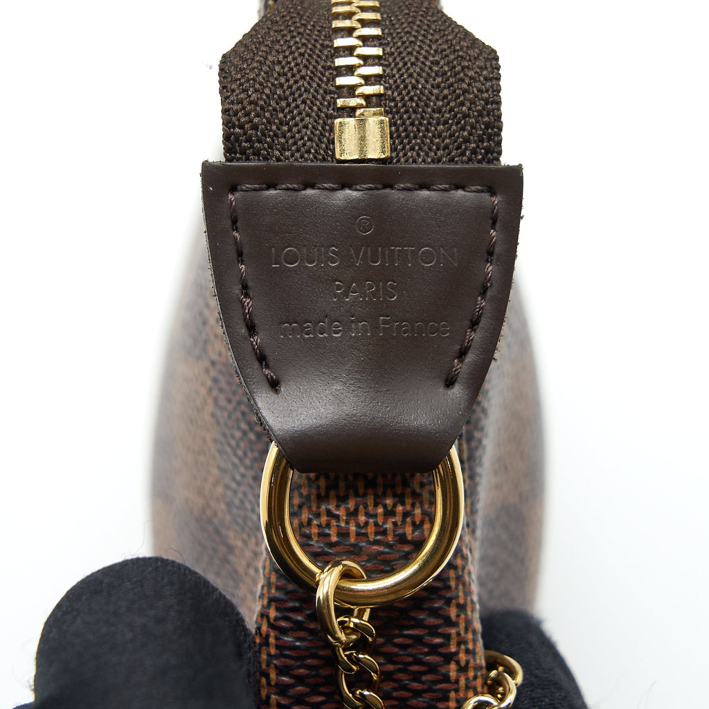 louis-vuitton-mini-pochette-accessories-damier-ebene-canvas-ghw-1
