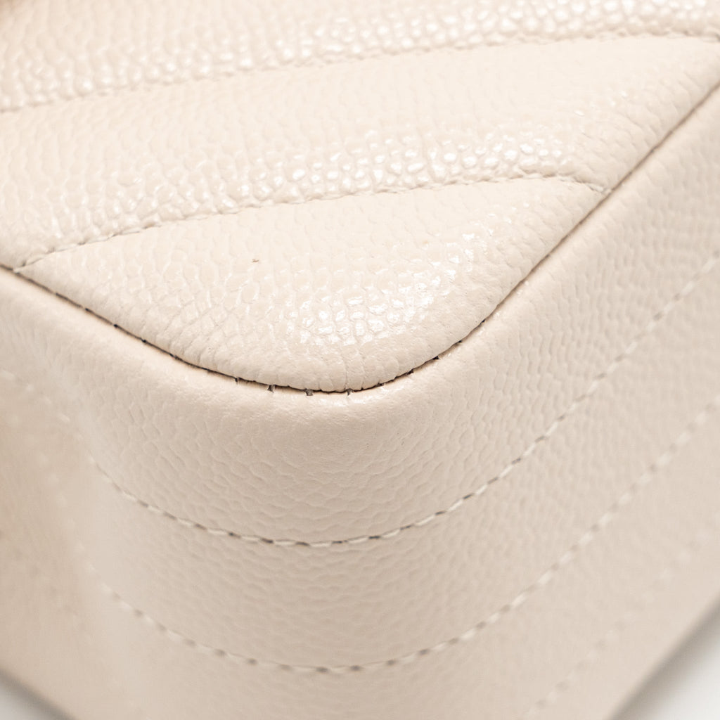 chanel-medium-classic-double-flap-bag-chevron-caviar-light-beige-lghw