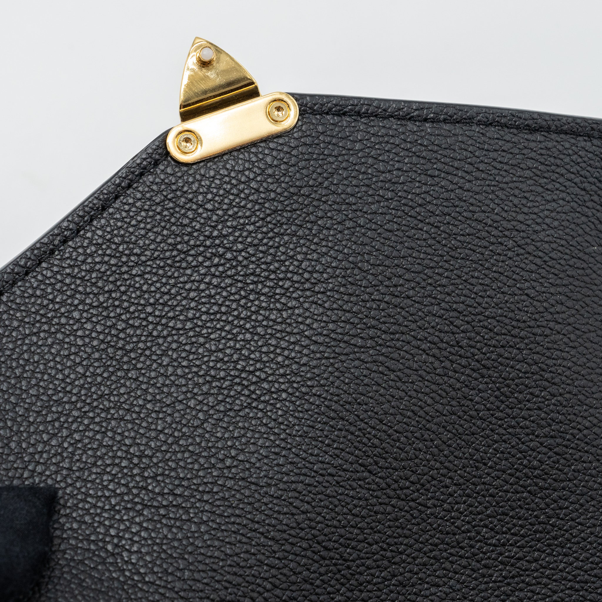 louis-vuitton-pochette-metis-empreinte-black-ghw