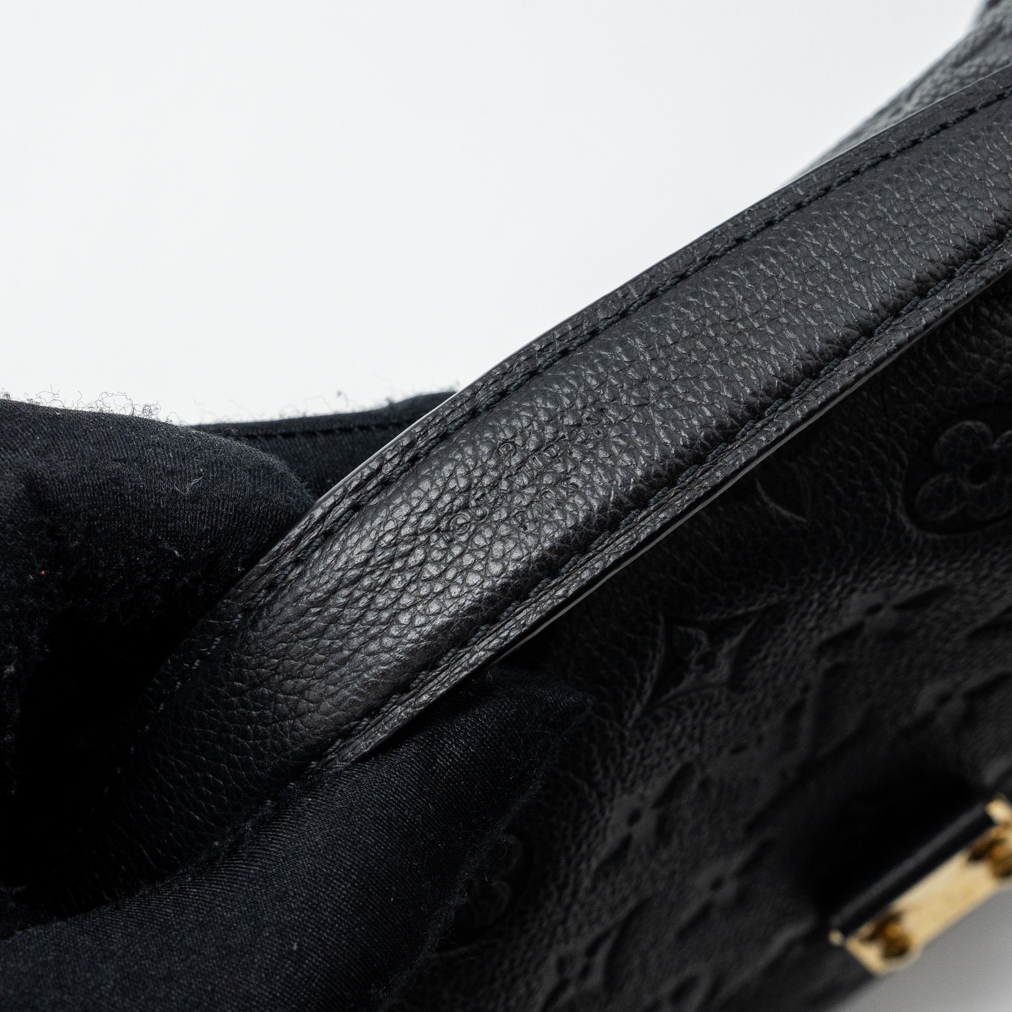 louis-vuitton-pochette-metis-empreinte-black-ghw