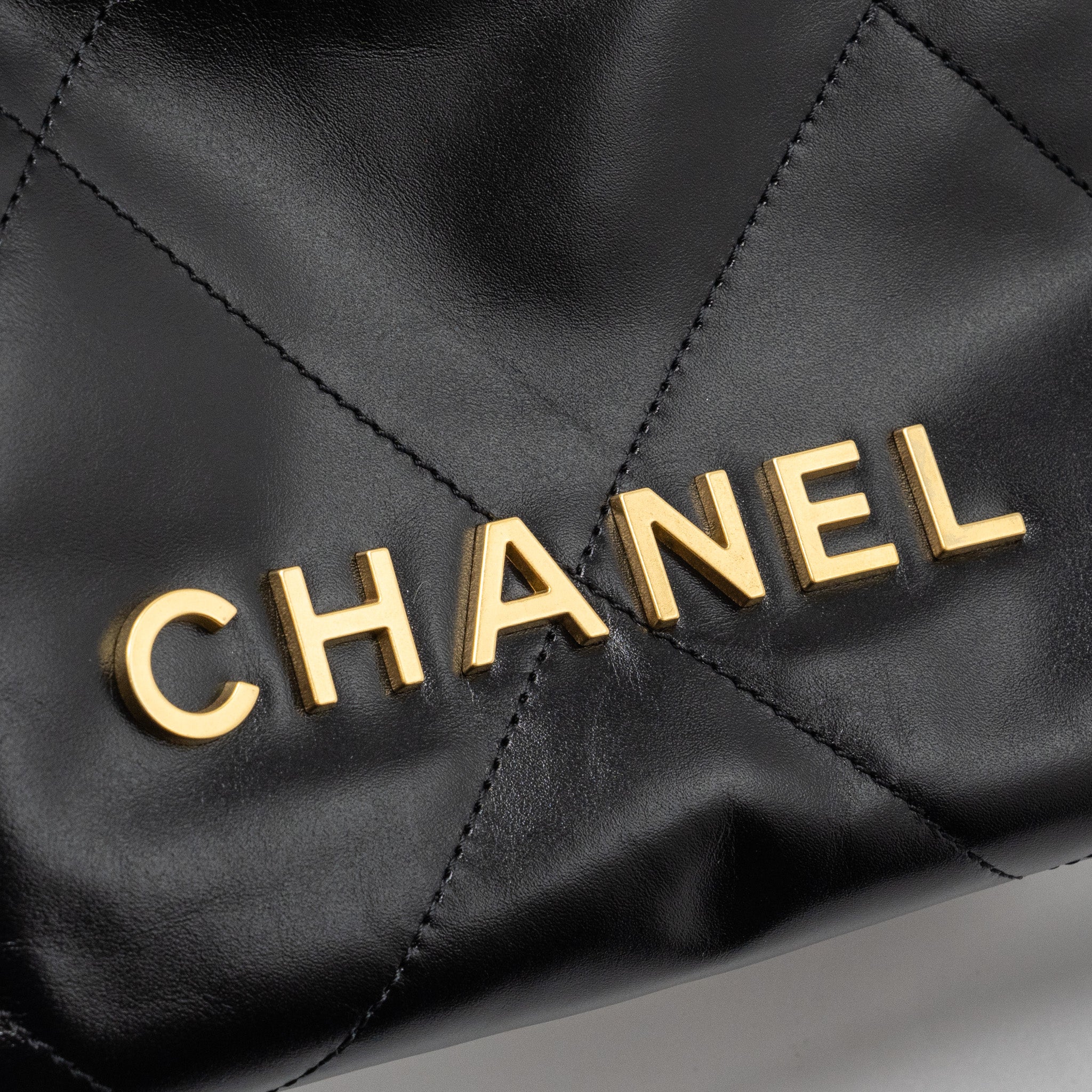 chanel-mini-22-bag-shiny-calfskin-black-ghw-microchip-1