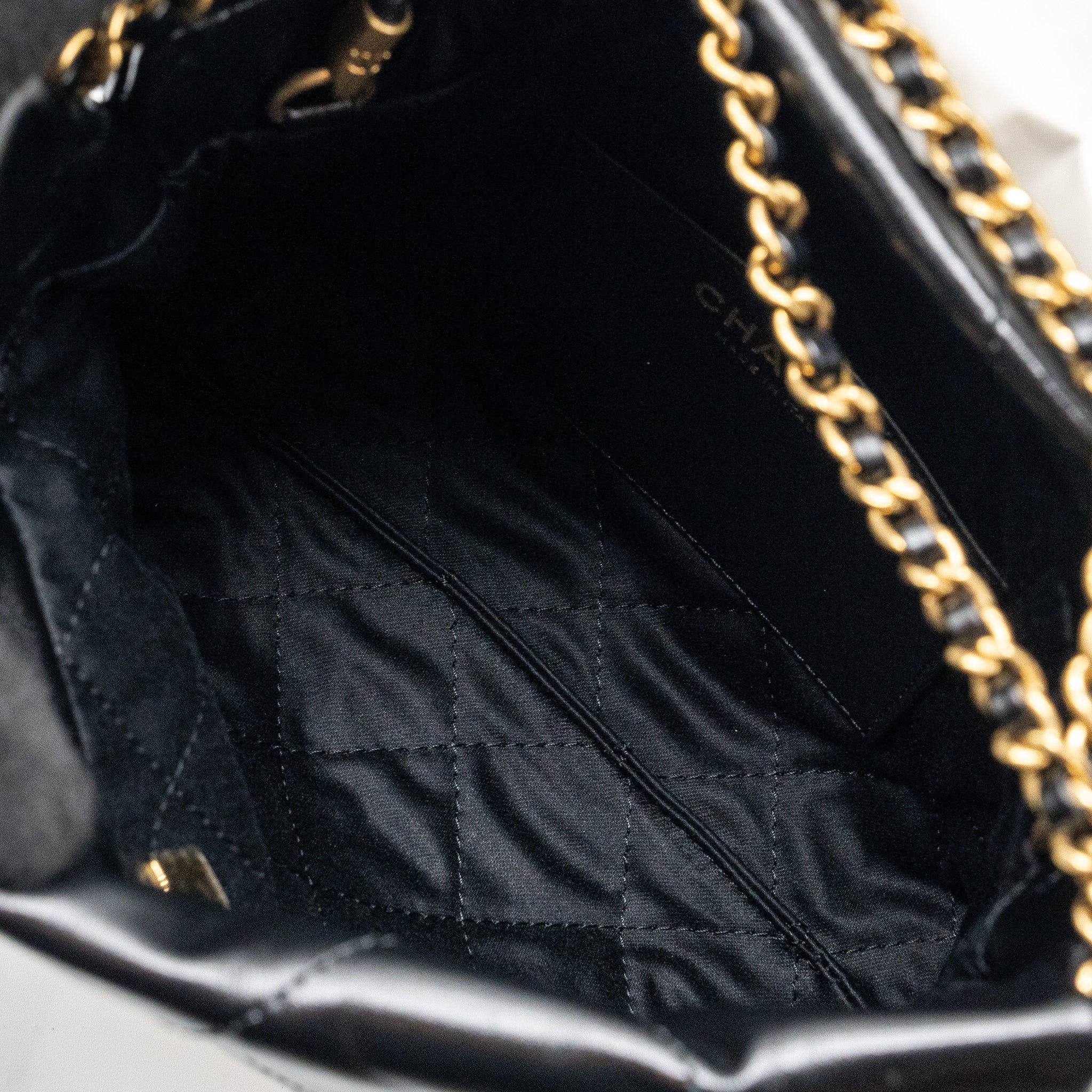 chanel-mini-22-bag-shiny-calfskin-black-ghw-microchip-1