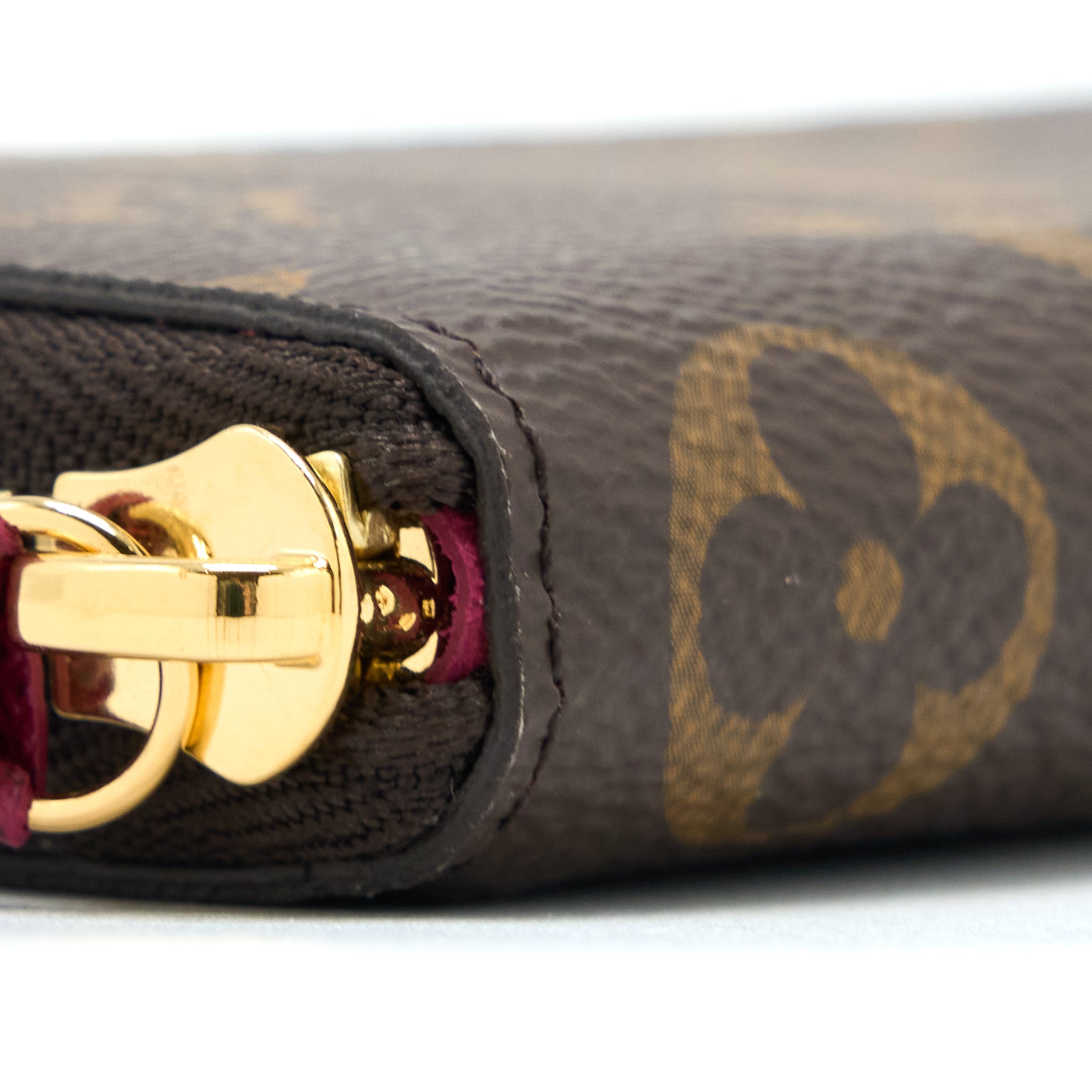 louis-vuitton-clemence-long-wallet-monogram-canvas-fuchsia-ghw