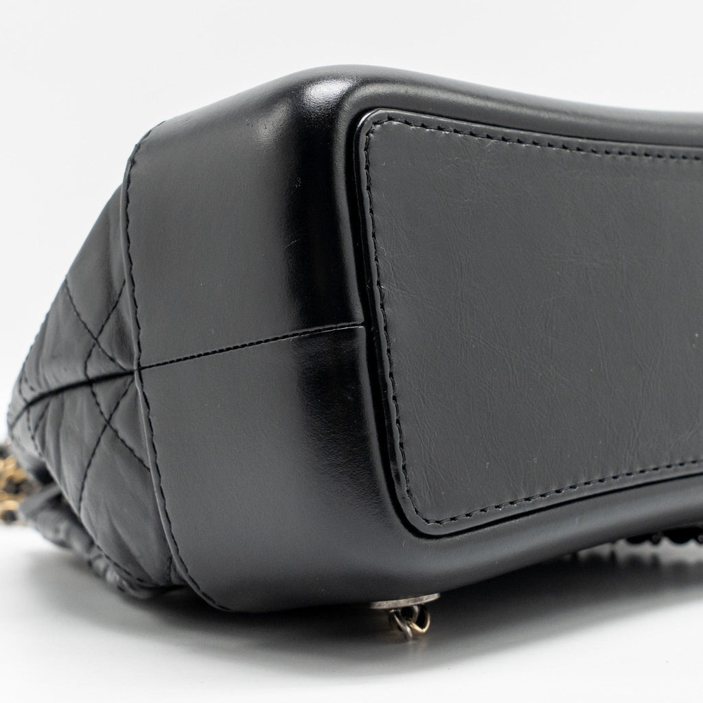 chanel-small-gabrielle-hobo-bag-aged-calfskin-black-multicoloured-hardware-1