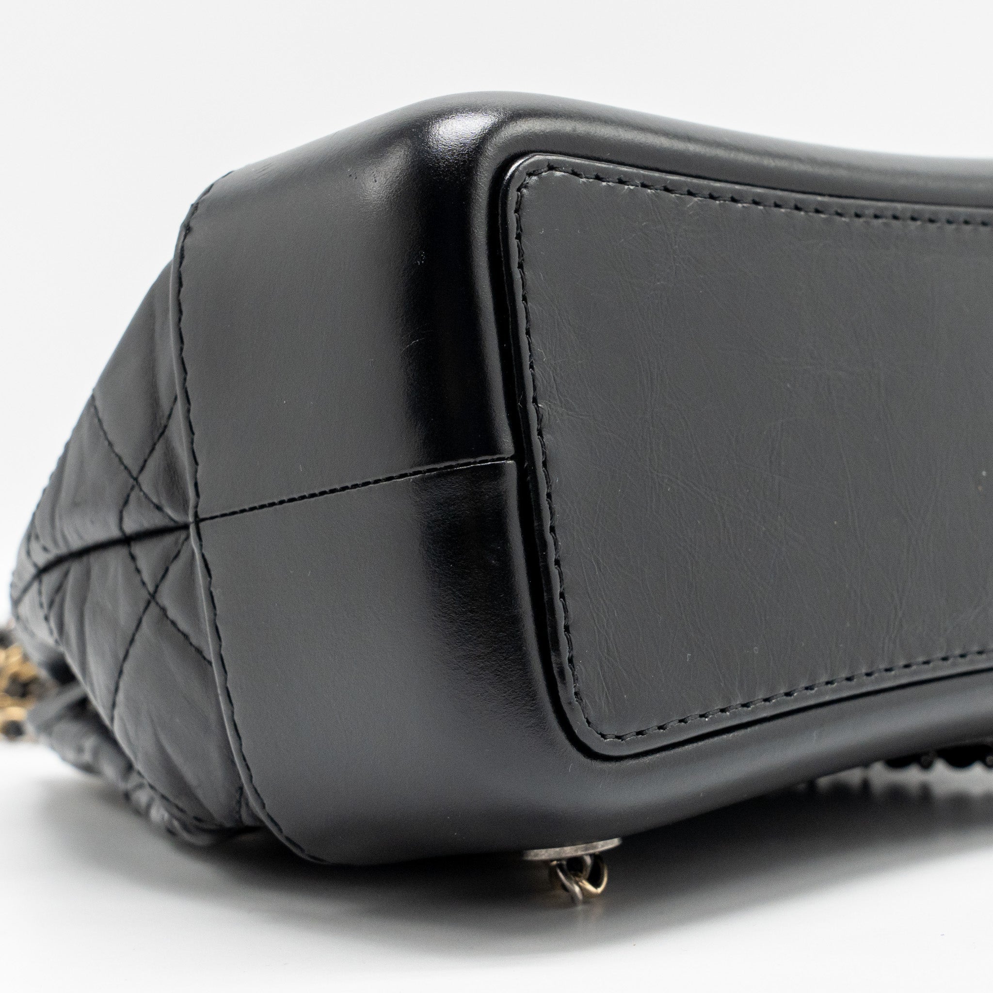 chanel-small-gabrielle-hobo-bag-aged-calfskin-black-multicoloured-hardware-1