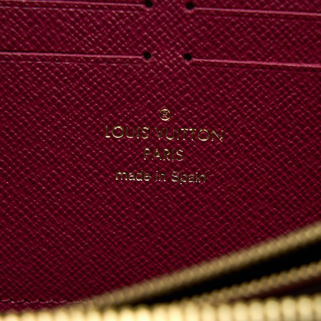 louis-vuitton-clemence-long-wallet-monogram-canvas-fuchsia-ghw