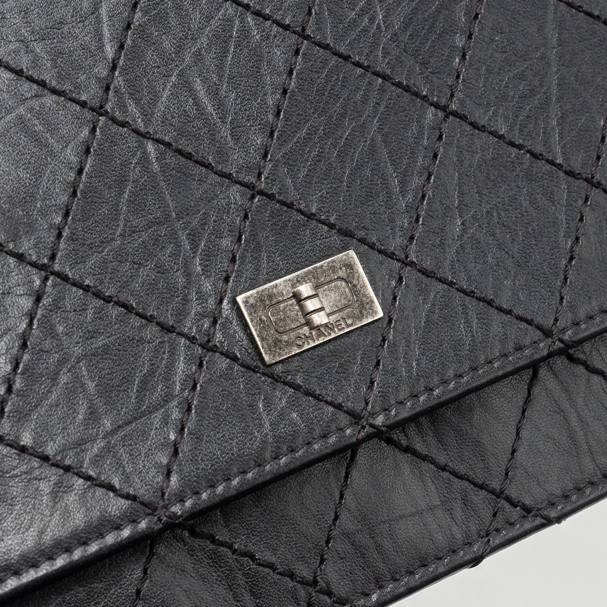 chanel-2-55-reissue-wallet-on-chain-calfskin-black-ruthenium-hardware