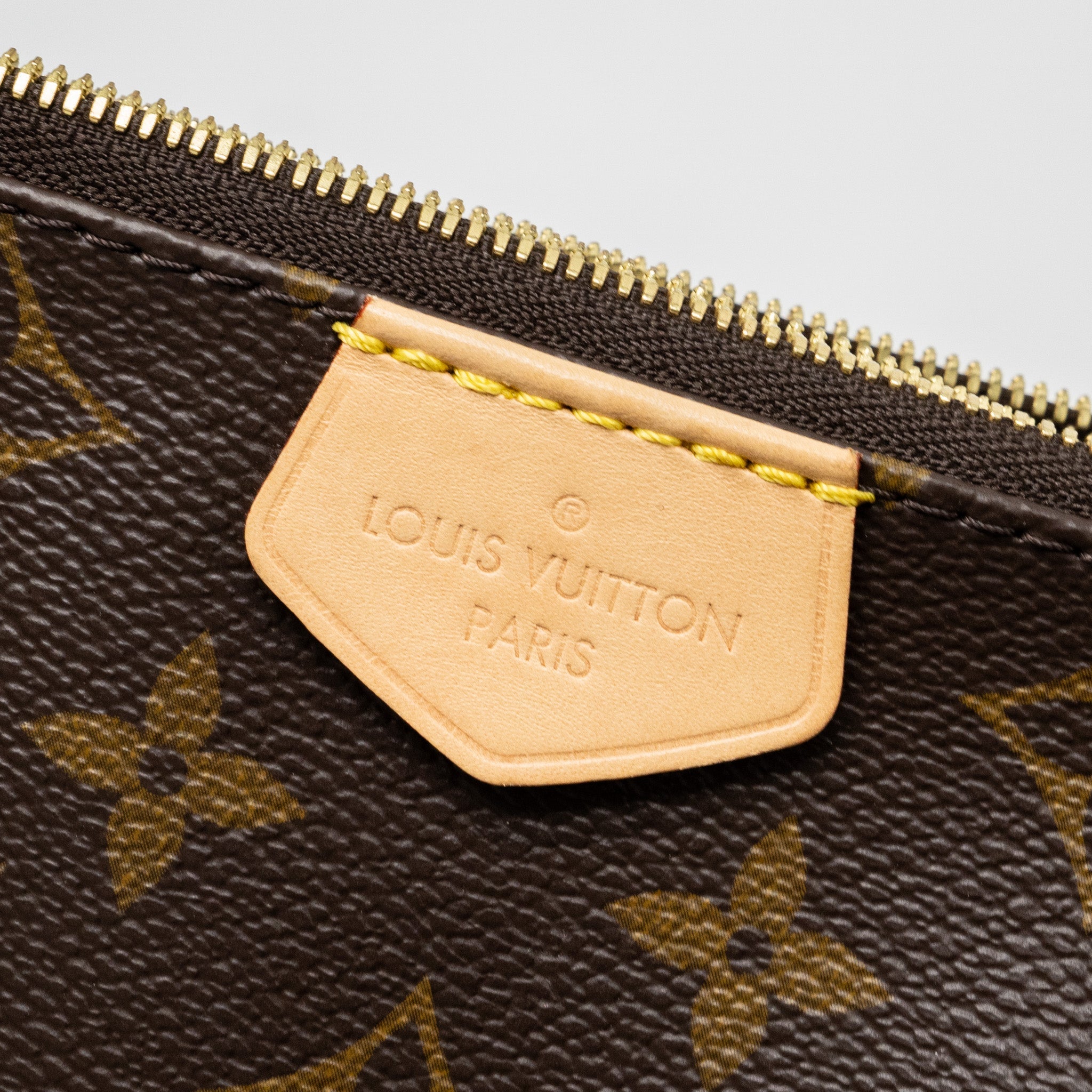 louis-vuitton-multi-pochette-monogram-canvas-with-khaki-strap