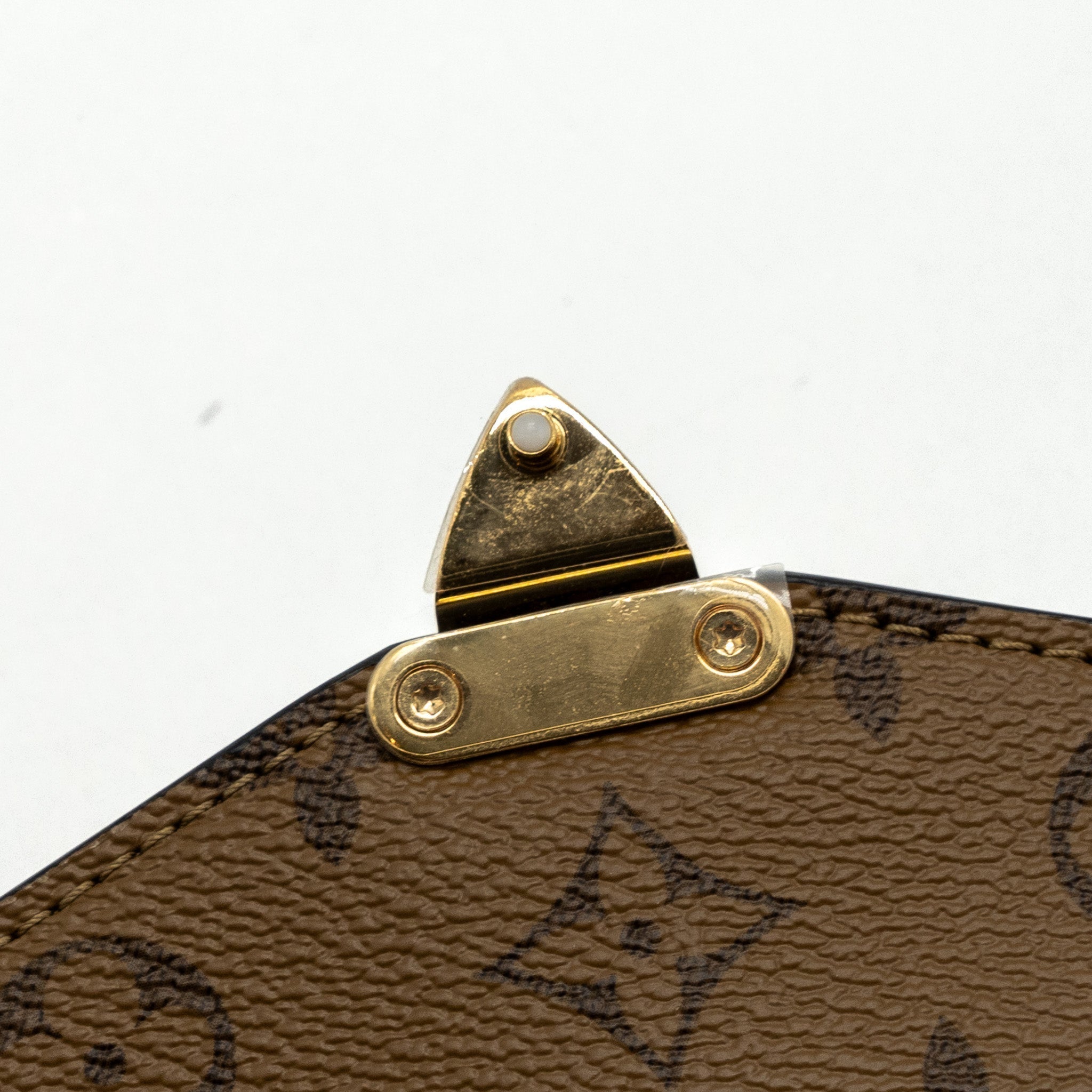 louis-vuitton-pochette-metis-monogram-reverse-canvas-ghw-6