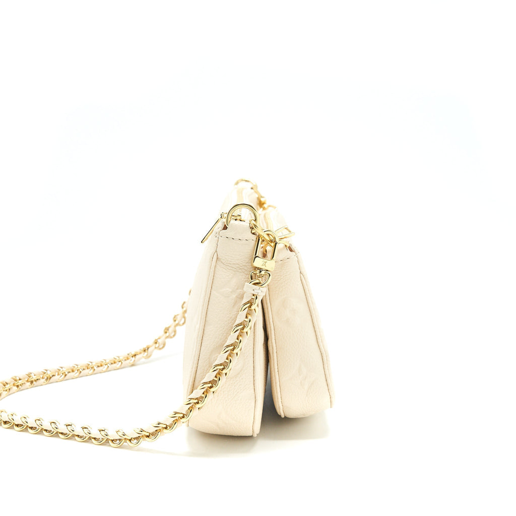 louis-vuitton-multi-pochette-in-white-leather