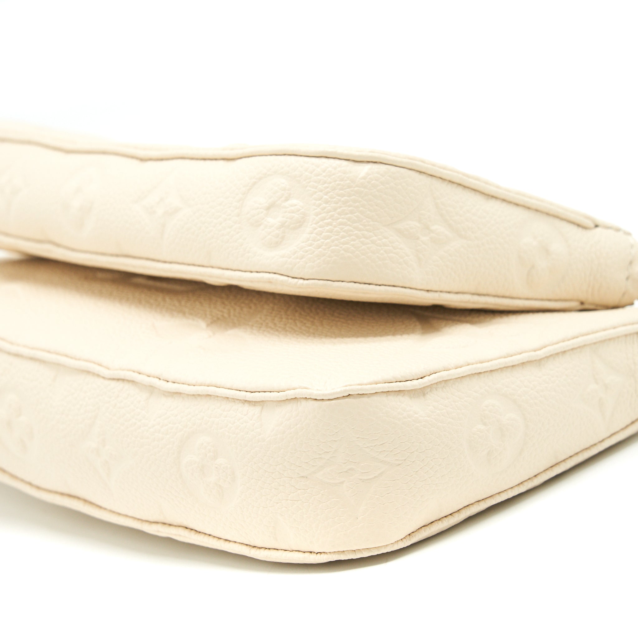 louis-vuitton-multi-pochette-in-white-leather