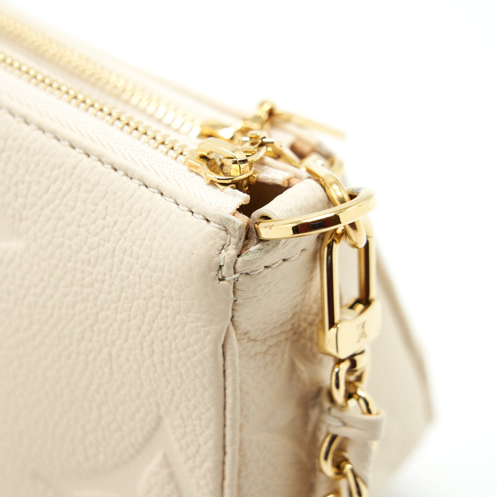 louis-vuitton-multi-pochette-in-white-leather