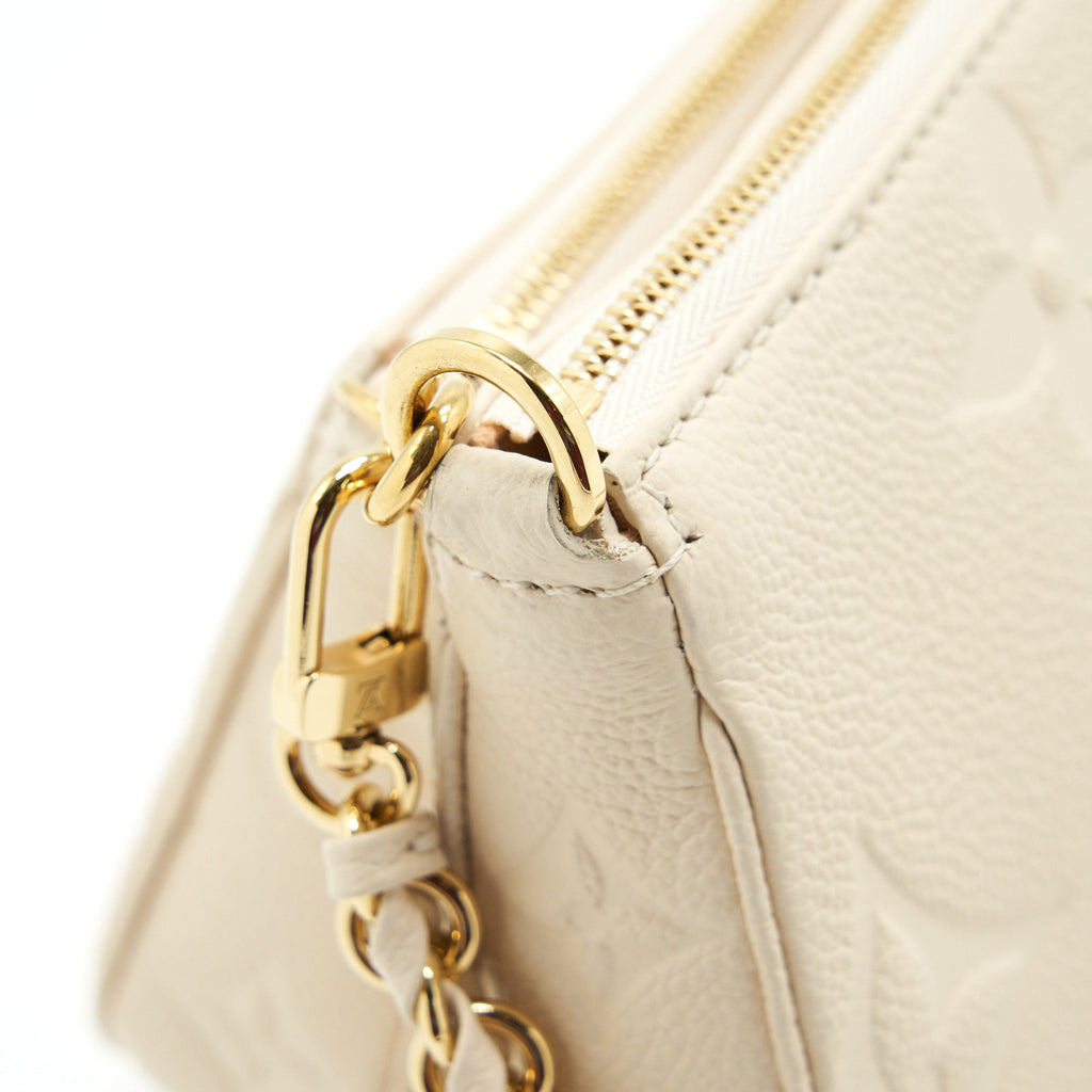 louis-vuitton-multi-pochette-in-white-leather