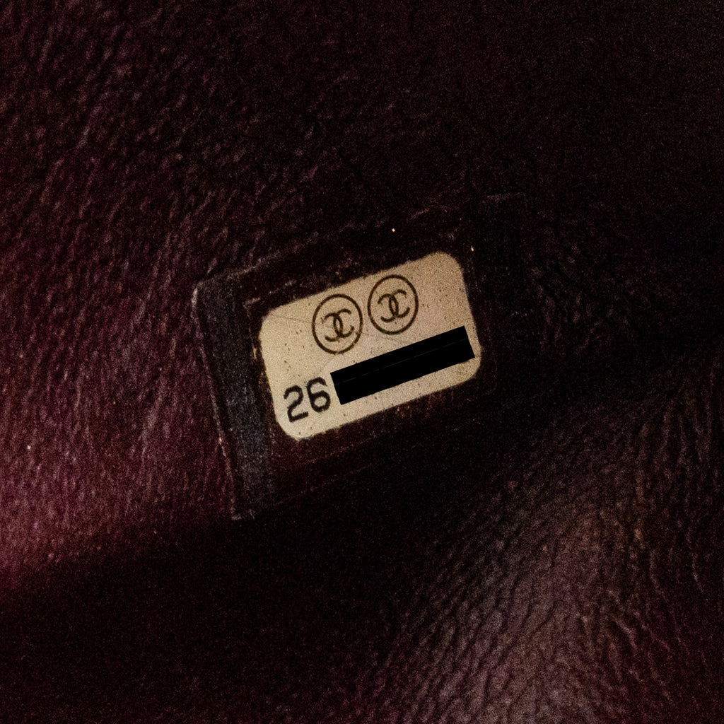 chanel-small-2-55-reissue-flap-bag-aged-calfskin-black-ghw-copy-1