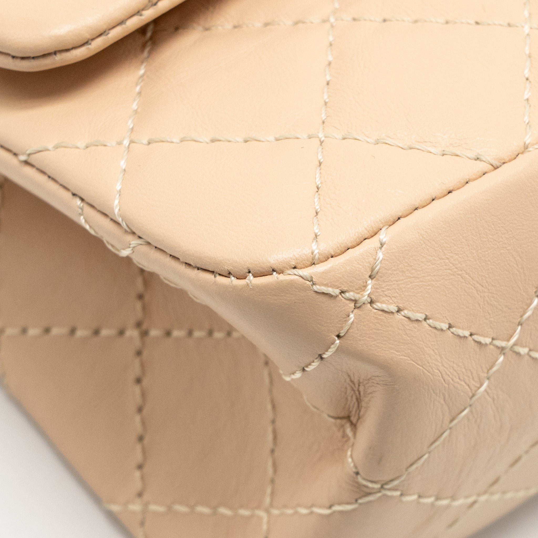 chanel-small-2-55-reissue-double-flap-bag-aged-calfskin-beige-ghw