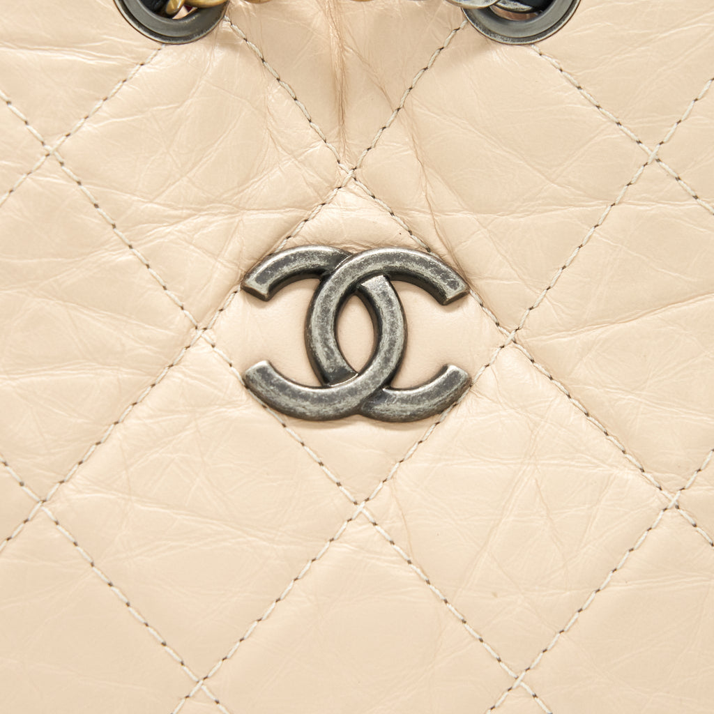 chanel-gabrielle-backpack-in-aged-calfskin-quilted-leather-beige