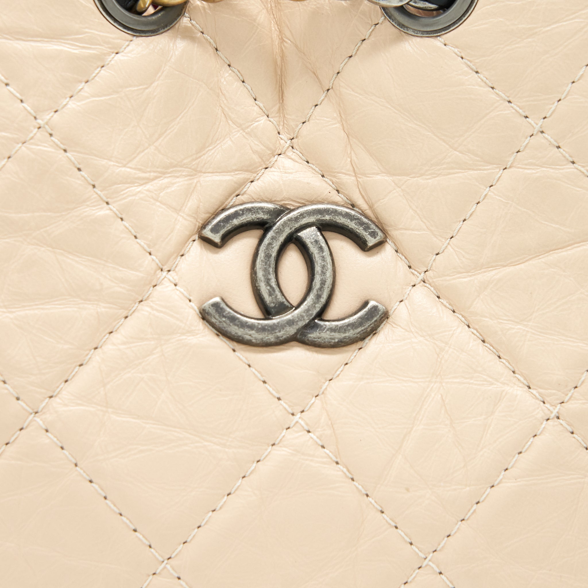 chanel-gabrielle-backpack-in-aged-calfskin-quilted-leather-beige