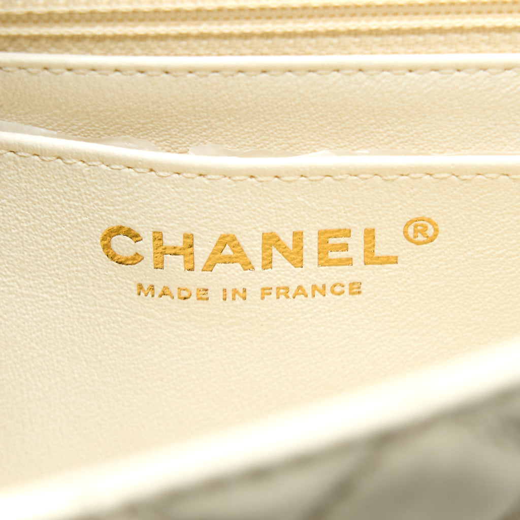 chanel-20a-mini-2-55-reissue-flap-bag-aged-calfskin-creamy-white-brushed-ghw