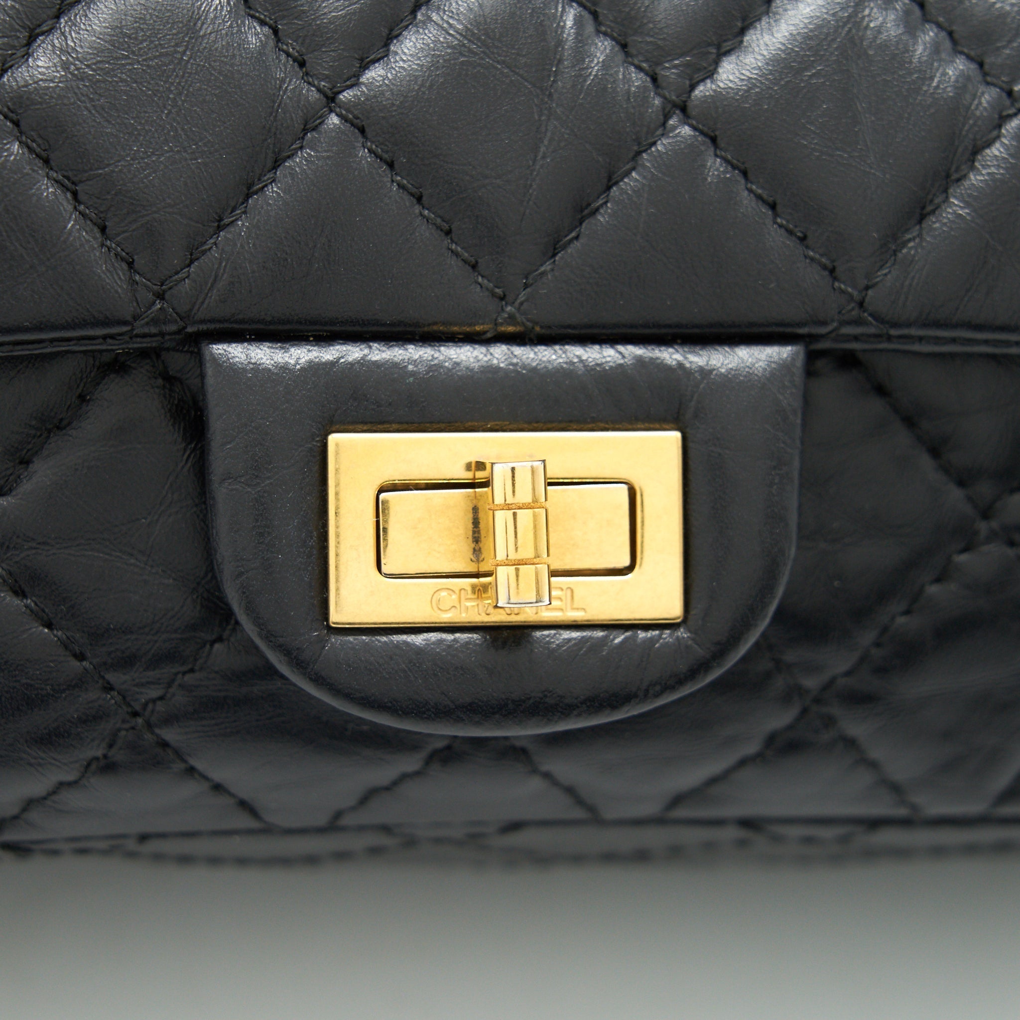 chanel-2-55-reissue-small-flap-bag-aged-calfskin-in-black-ghw-1