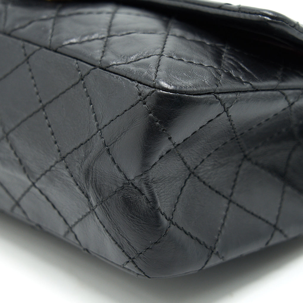 chanel-2-55-reissue-small-flap-bag-aged-calfskin-in-black-ghw-1
