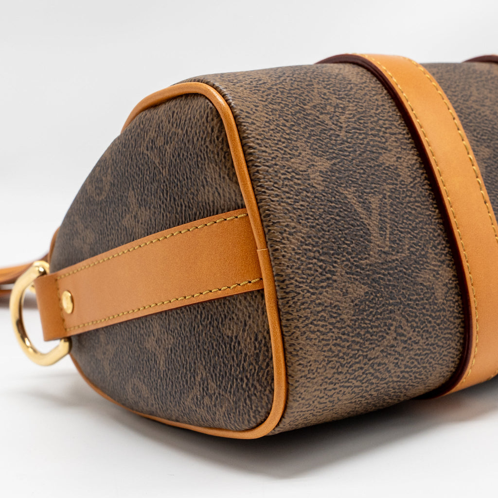 louis-vuitton-keepall-bandouliere-25-monogram-dust-coated-canvas-ghw