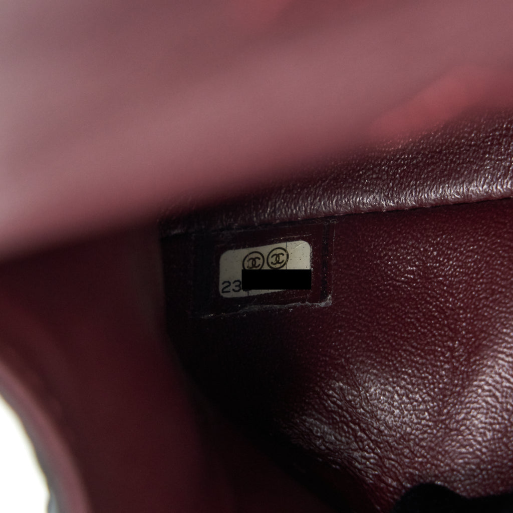 chanel-2-55-reissue-small-flap-bag-aged-calfskin-in-black-ghw-1