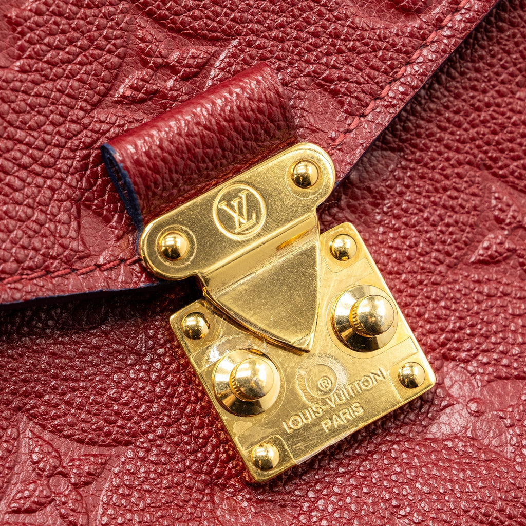 louis-vuitton-pochette-metis-monogram-empreinte-red-ghw