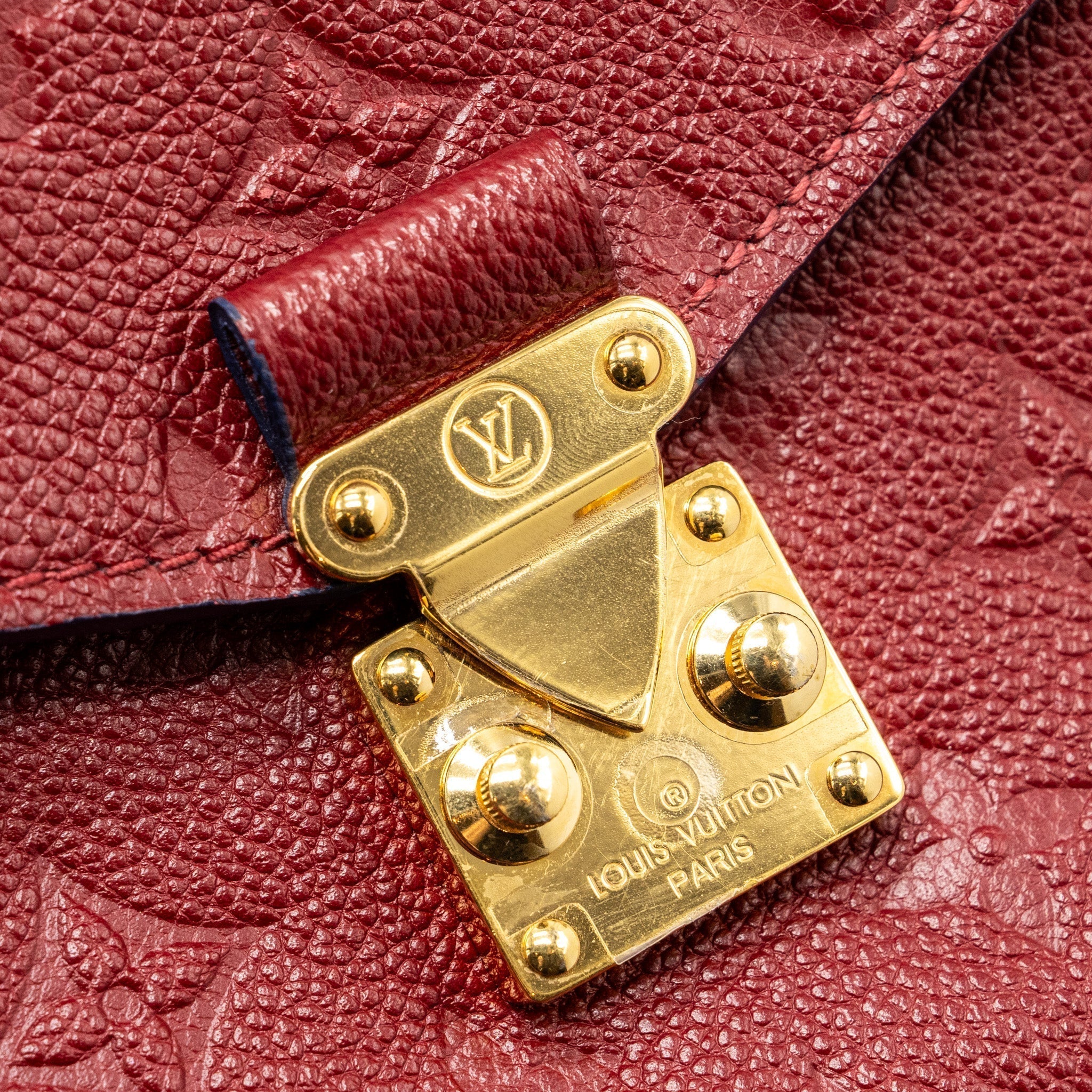 louis-vuitton-pochette-metis-monogram-empreinte-red-ghw