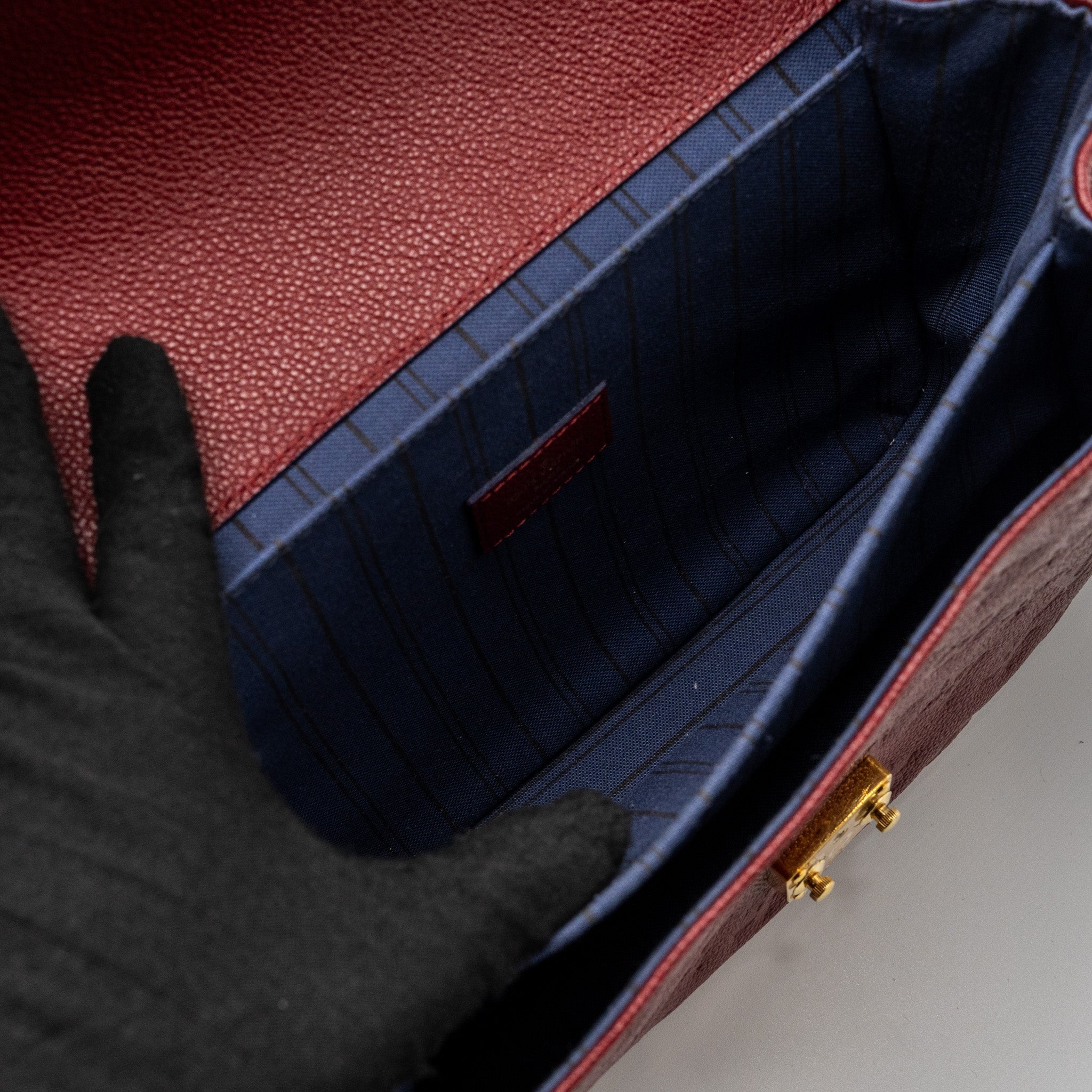 louis-vuitton-pochette-metis-monogram-empreinte-red-ghw