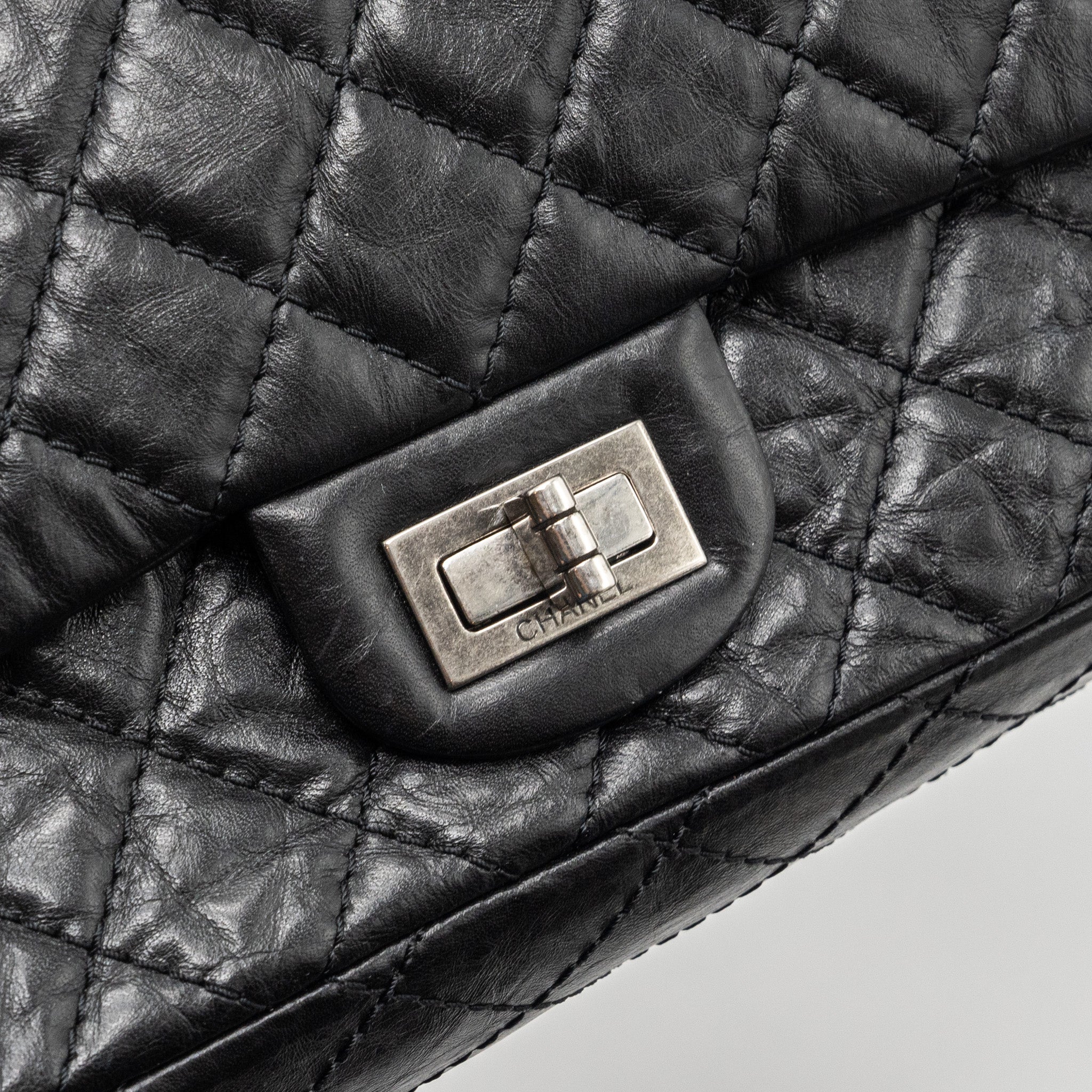 chanel-small-2-55-reissue-flap-bag-aged-calfskin-black-ruthenium-hardware-1