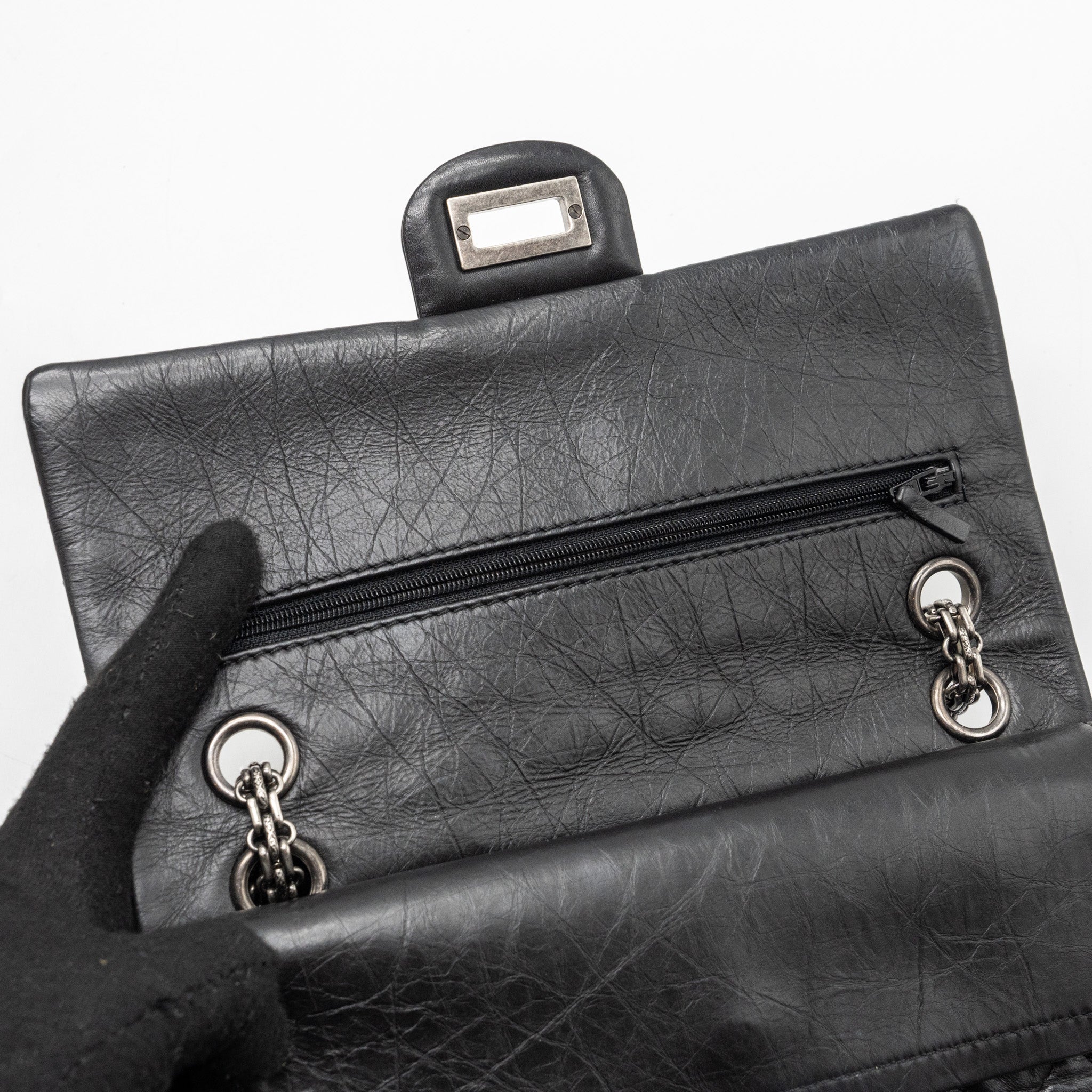 chanel-small-2-55-reissue-flap-bag-aged-calfskin-black-ruthenium-hardware-1
