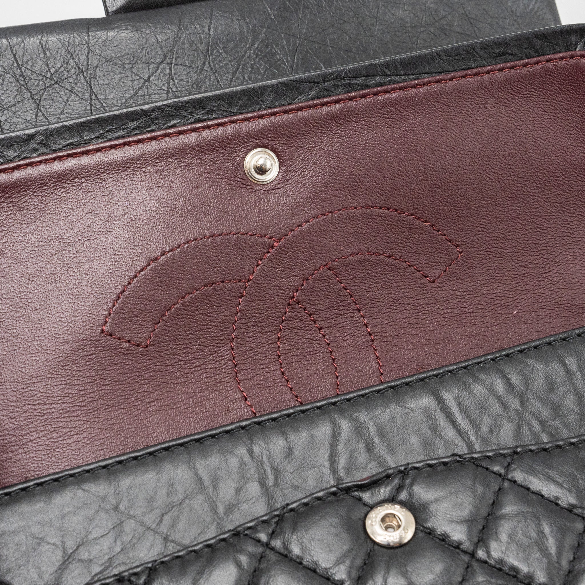chanel-small-2-55-reissue-flap-bag-aged-calfskin-black-ruthenium-hardware-1
