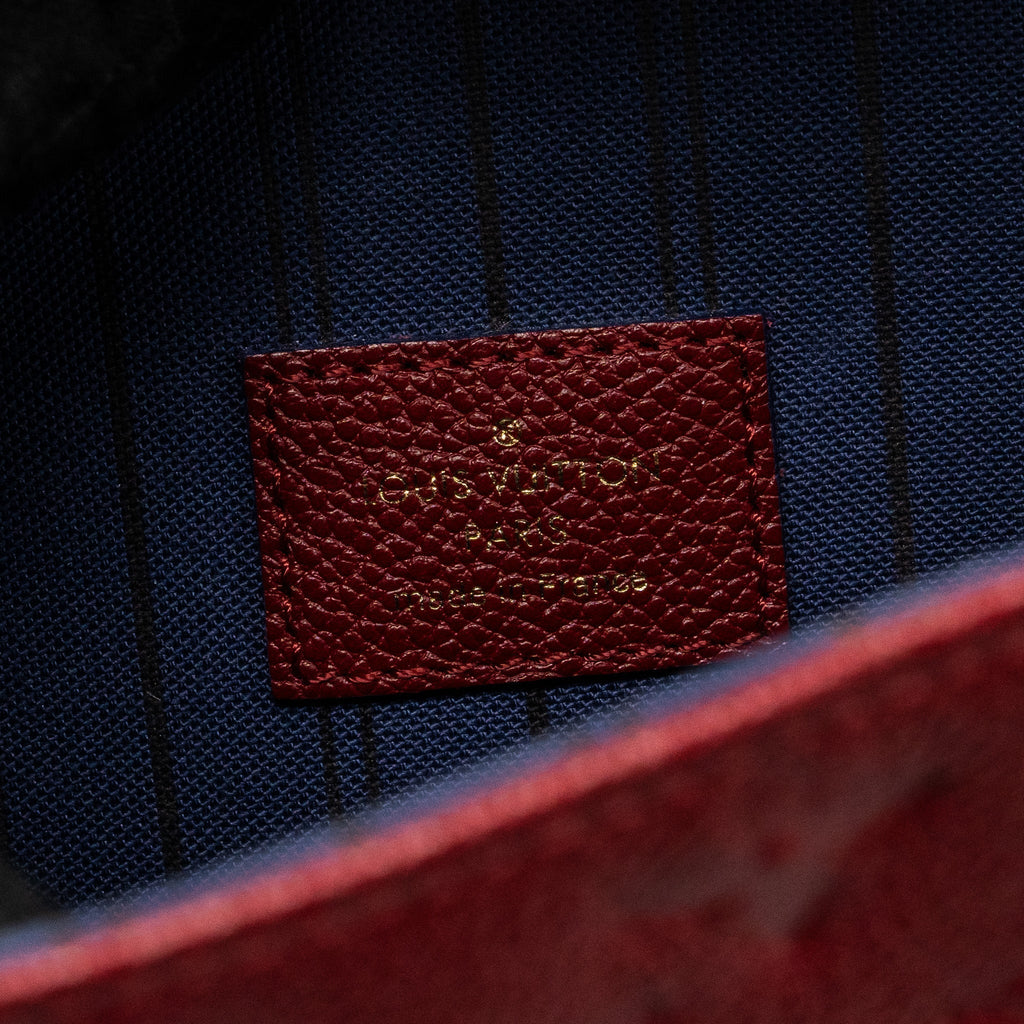 louis-vuitton-pochette-metis-monogram-empreinte-red-ghw