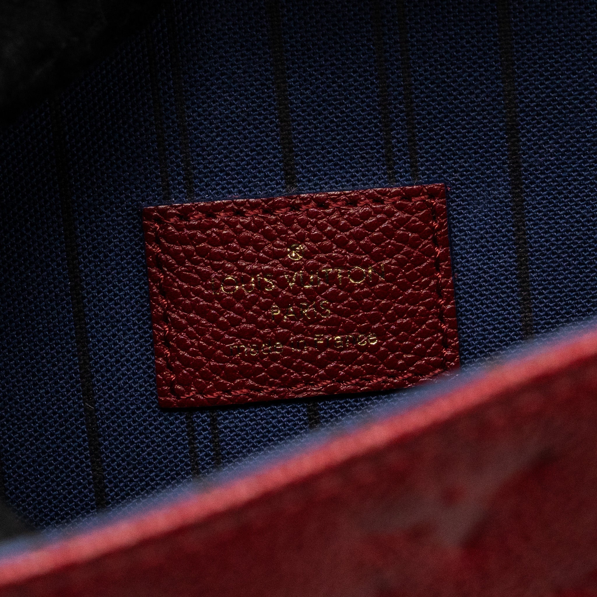 louis-vuitton-pochette-metis-monogram-empreinte-red-ghw