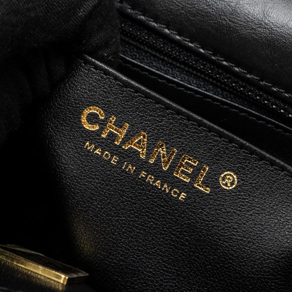 chanel-mini-2-55-reissue-flap-bag-aged-calfskin-black-ghw-microchip-2