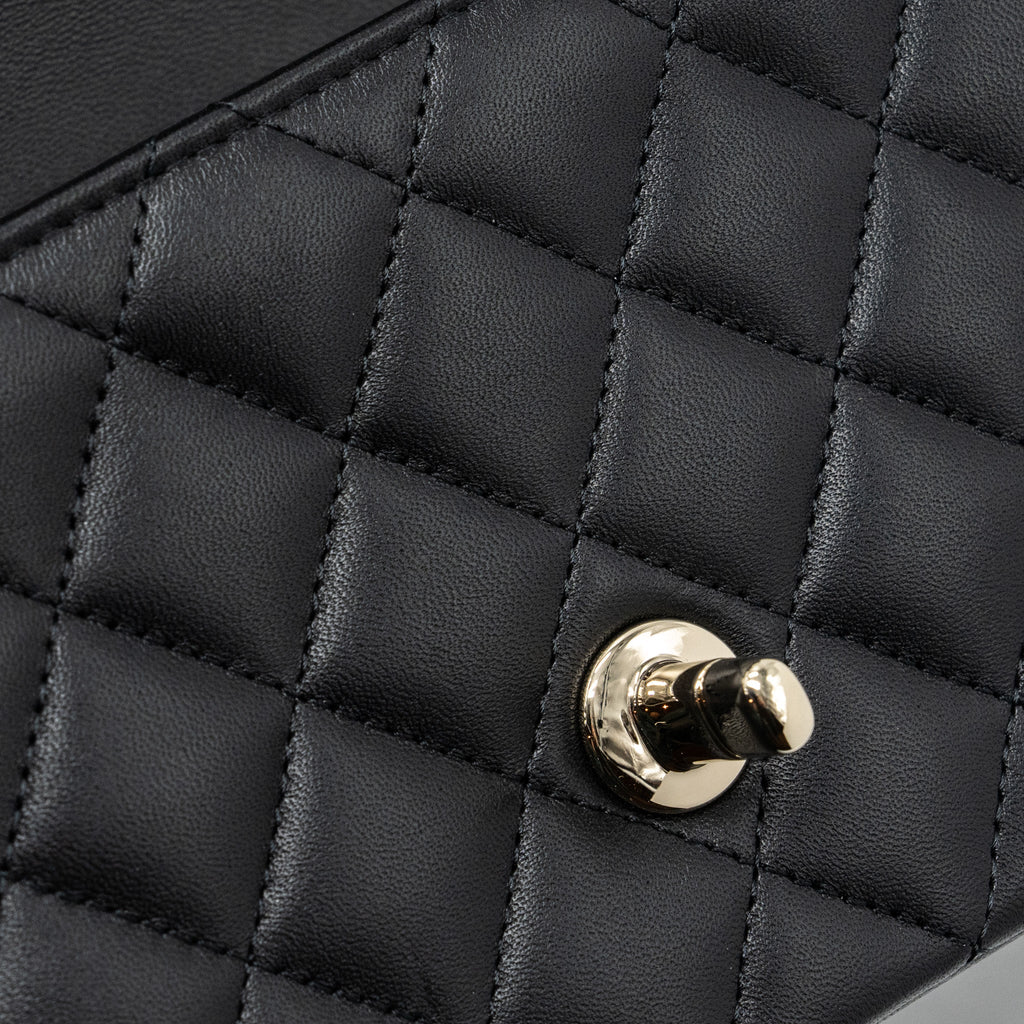 chanel-22p-lion-charm-top-handle-mini-rectangular-flap-bag-lambskin-black-lghw-microchip