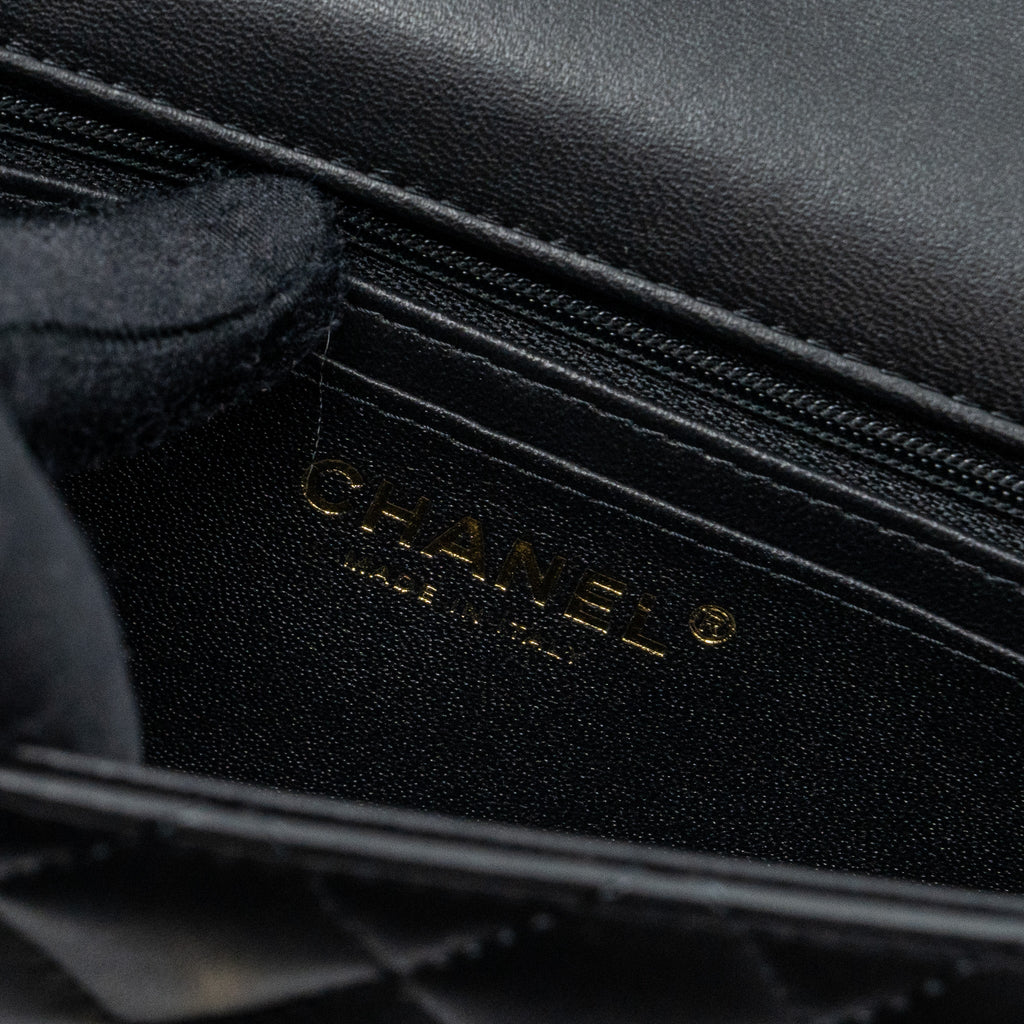 chanel-22p-lion-charm-top-handle-mini-rectangular-flap-bag-lambskin-black-lghw-microchip