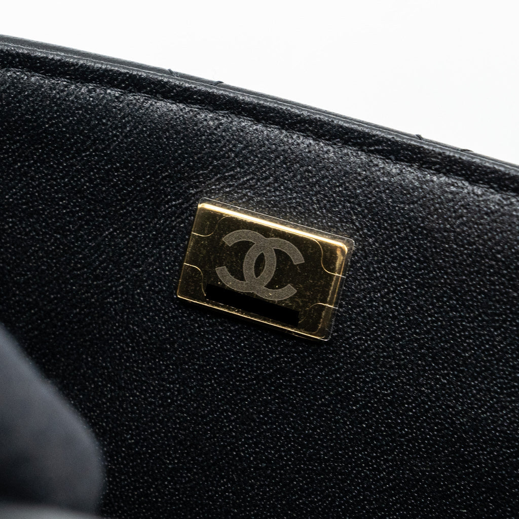 chanel-22p-lion-charm-top-handle-mini-rectangular-flap-bag-lambskin-black-lghw-microchip
