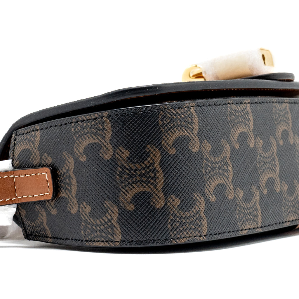 celine-clutch-on-strap-tabou-in-triomphe-canvas-calfskin-tan-ghw