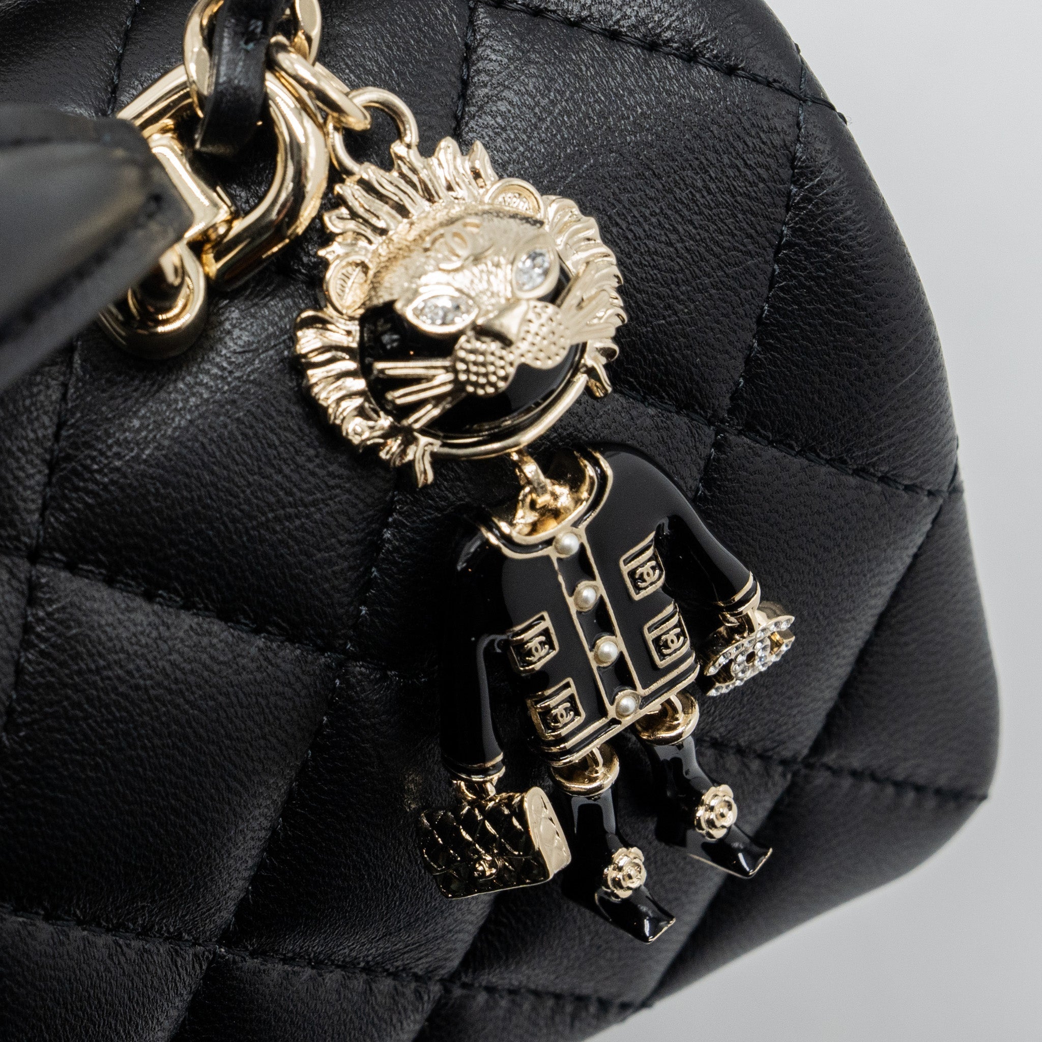 chanel-22p-lion-charm-top-handle-mini-rectangular-flap-bag-lambskin-black-lghw-microchip