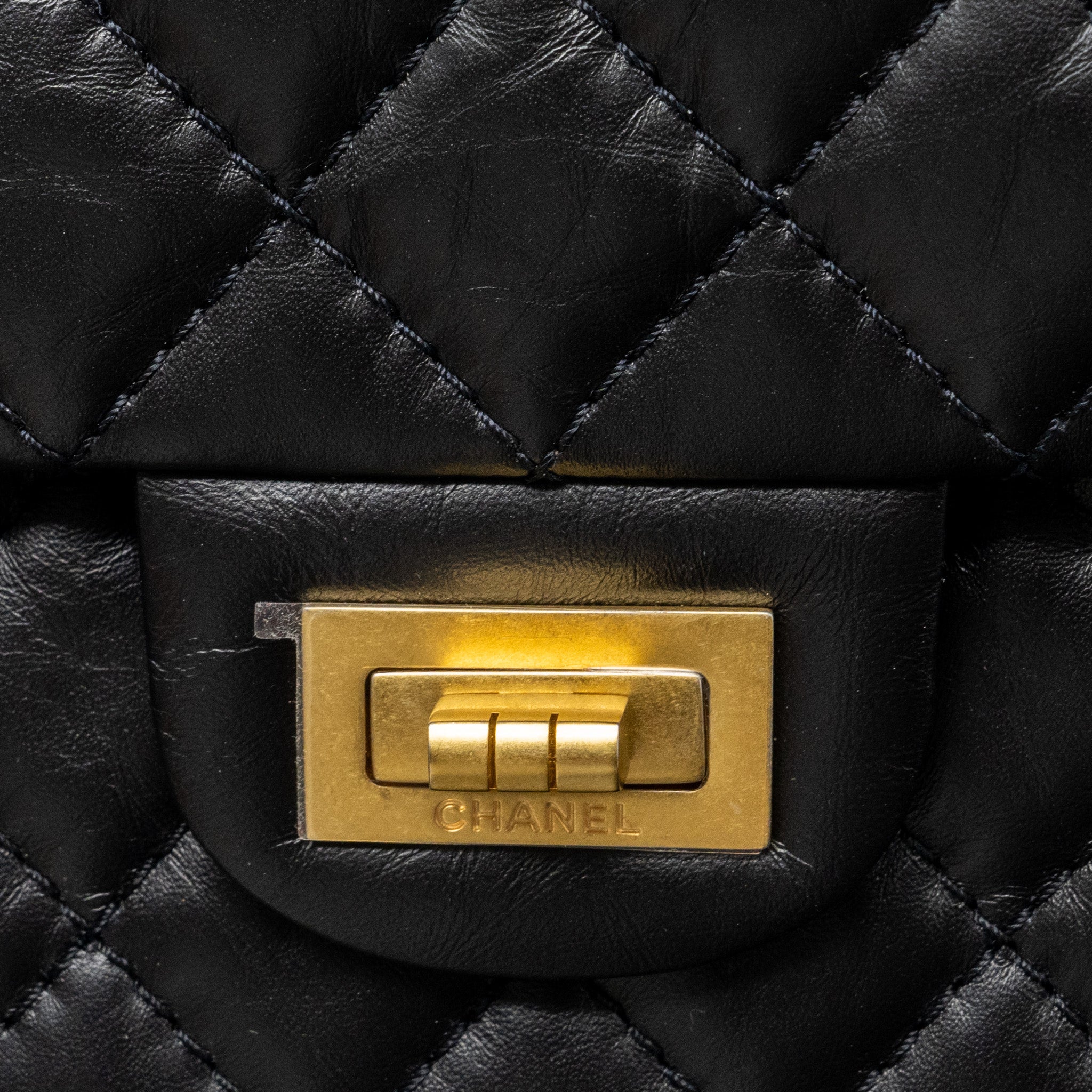 chanel-mini-2-55-reissue-flap-bag-aged-calfskin-black-ghw-microchip-1