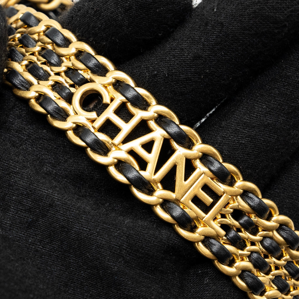 chanel-letter-logo-top-handle-flap-wallet-with-chain-shiny-calfskin-black-ghw-microchip