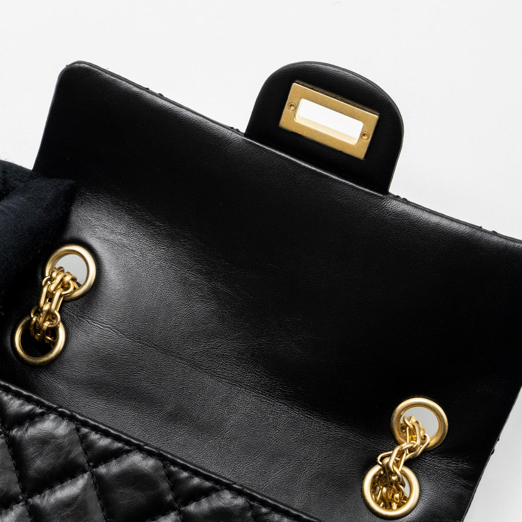 chanel-mini-2-55-reissue-flap-bag-aged-calfskin-black-ghw-microchip-1