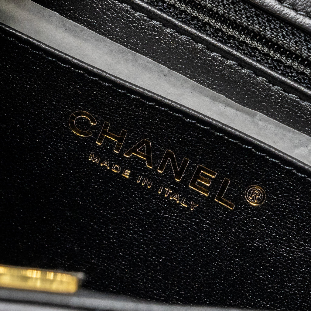 chanel-mini-2-55-reissue-flap-bag-aged-calfskin-black-ghw-microchip-1